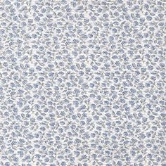 a blue and white floral pattern on fabric