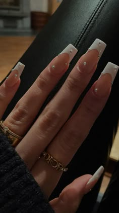 White French tip nails with sparkly rhinestones White Sparkly French Tip Acrylic Nails, Cute French Tip Nails Acrylic With Design, Cute White Tip Acrylic Nails, Nail Idea French Tip, Elegant Nails Aesthetic, White Nail Aesthetic, Acrylic Nails Wedding, Elegant Acrylics, Cute Aesthetic French Tip Nails