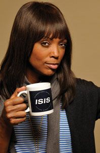 a woman holding a coffee mug in her right hand