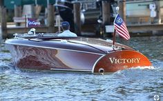 a motor boat with an american flag on it