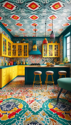 a colorful kitchen with yellow cabinets and stools