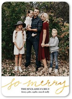 a family photo with the words go merry in gold foil on white paper, surrounded by leaves