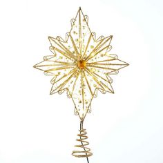 a gold christmas ornament with a star on it's top and spiral wire around the base