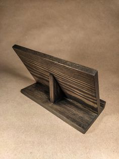 a small wooden object sitting on top of a table