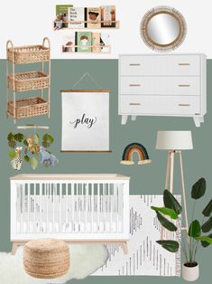 a baby's room with green walls and white furniture