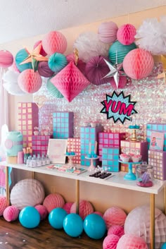 a room filled with pink and blue decorations