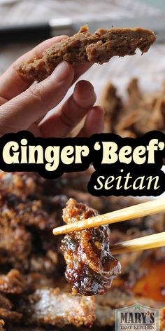 a hand holding chopsticks with meat on it and the words ginger beef seitan