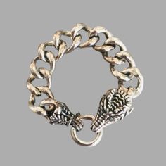 Dragon Chain Bracelet Unisex Perfect For Mens And Women Sterling Silver 925 Bracelet Weight: 1.14 Oz Hollow Watch As This Majestic Creatures Swirls Around Your Wrist. It Sits Close To The Wrist, Flush Against The Skin And Striking On Its Own Allow This Piece To Stand Out In Your Collection, It Fastens Through The Mouth Of The Dragon Made In Thailand Majestic Creatures, The Dragon, Womens Jewelry Bracelets, Chain Bracelet, Silver 925, Thailand, 925 Sterling Silver, Stamp, Women Jewelry