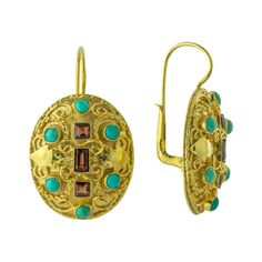 Lady Ashford Turquoise & Garnet Earrings: $179.95  These earrings' aesthetic and spiritual allure remain strong. Drawing inspiration from intricate Byzantine designs, these Victorian discs of elaborate 24k gold over sterling silver filigree work are inlaid with turquoise and garnets. European backs for pierced ears. Size: 1 3/8 inches. Ornate Antique Gold Pierced Earrings, Ornate Historical Design Earrings, Traditional Turquoise Jewelry With Filigree, Victorian Turquoise Filigree Jewelry, Ornate Gold-colored Sterling Silver Earrings, Byzantine Jewelry, Earrings Aesthetic, Lapis Earrings, Hot Jewelry