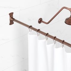 a shower curtain rod is attached to the wall