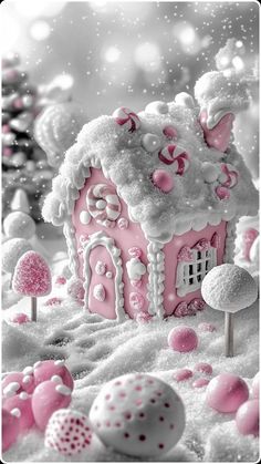 a pink and white house in the snow surrounded by trees, mushrooms, and eggs