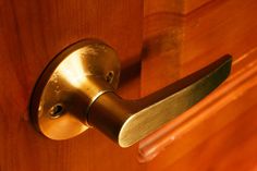 a door handle on a wooden door