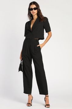 The Lulus Posh Company Black Pleated High-Waisted Trouser Pants will take your confidence levels to new heights! These dress pants are composed of woven fabric that shapes a pleated high-rise silhouette (with elastic at the back for fit), belt loops, a fabric-covered top button, and a hidden zip-fly. Relaxed, straight pant legs with side seam pockets end at ankle-length hems. Pair with the matching blazer for a complete lo Black Dress Pants Outfits, Black High Waisted Pants, Jumpsuit For Wedding Guest, Dress Pants Outfits, Clothes For Work, Casual Formal Dresses, Classy Winter Outfits, Wedding Guest Outfits, Dressy Pants