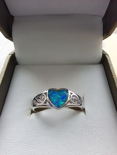 Brand new  Pretty heart design  Sterling Silver with a lab Opal  Size Q UK  Size 8 USA Pretty Heart, Silver Lab, Solitaire Rings, Dress Rings, Diamond Cluster Ring, Garnet Rings, Opal Ring, Diamond Cluster, Opal Rings