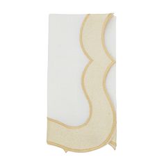 an image of a white and gold towel on a white background with the letter b