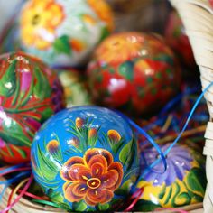 colorful painted easter eggs in a basket