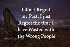 a boat sitting on top of a sandy beach under a cloudy sky with the words, i don't reget my past, just regt, i just regent the time i have wasted