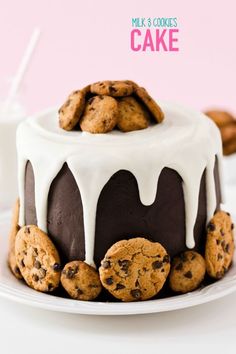 a cake with chocolate chip cookies and white icing