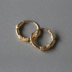 Delicate minimal gold plated sterling silver jewelry. Our products are made with 925 sterling silver and are hypoallergenic and nickel free! ♥︎ Check out our new silver supply shop: https://www.etsy.com/shop/InspireSilver This listing is for a PAIR of hoops.  ✨ Hoop dimensions 14mm outer diameter, 12mm inner diameter  1.2mm thickness ✨ Material 925 sterling silver  18k gold plating 🎁 Every order comes in a cute jewelry box ready to gift.🇹🇭 We ship from Bangkok, Thailand. 🤩 Flat shipping rate Gold Bali, Gold Minimalist Jewelry, Minimal Gold, Bali Earrings, Hoops Gold, Cute Gift Boxes, Fun Earrings, Jewelry Earrings Hoops, Gold Gold