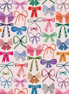 many different colored bows on a white background