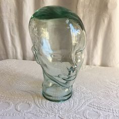 "Vintage Glass Head Jar 1970-1980. Opening is Stand on Bottom. Use for a Hat Stand or Wig Stand. Great Shop Display for Headphones. Charming Display. This light green glass head jar is in good shape. No chips or cracks.  Size: 6 1/4\" X 7 3/4\" X 11\" Tall  For more vintage items go to:  www.VeryVictorianStudio.etsy.com. For sewing related items see my other shop: www.SewingRoomStore.etsy.com. Thank you for Looking!" Glass Head, Hat Stand, Teal Walls, Wig Stand, Hat Stands, Kitchen Jars Storage, Snowflake Ornaments, Head Shapes, Shop Display