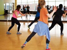 a group of people in a dance class