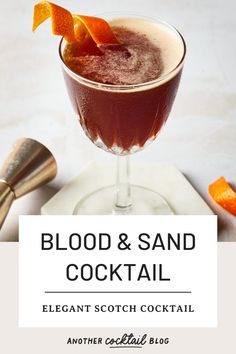 blood and sand cocktail with an orange garnish