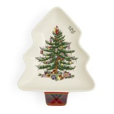 a ceramic christmas tree shaped dish on a white background with red and green plaid trim