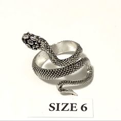 Snake Ring Wrap, Size 6 Silver Tone With Black Highlights Somewhat Sizable Brand New Condition, Please See Pictures For Condition And Details, Thanks. Unisex Ring, Can Be Worn By Men And Women, Same Sizing On Ring Sizes. I Size All My Rings With A Mandrel So Sizes Are Accurate To Us Ring Sizes. Ring Wrap, Black Highlights, 6 Rings, Snake Ring, Unisex Ring, Ring Sizes, Wrap Rings, Womens Jewelry Rings, Black Silver