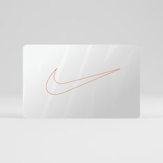 a white business card with an orange nike logo on the front and back side, against a gray background