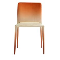 an orange and white chair against a white background