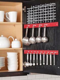 an open cabinet filled with kitchen utensils