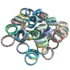 many different colored rings sitting on top of each other