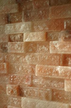 a brick wall that is made out of different types of bricks