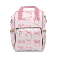 a pink and white backpack with bows on it