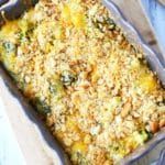 a casserole dish with broccoli and cheese