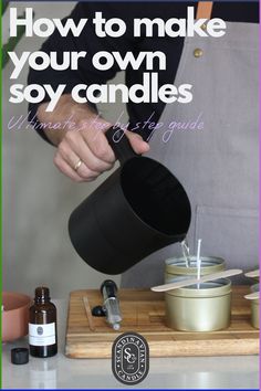 a person pouring some sort of liquid into a cup with the words how to make your own soy candles