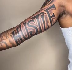 a man with a tattoo on his arm that says sunshineside and has the words sunshineside written across it