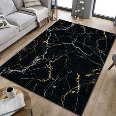 a black and gold marble rug in a living room