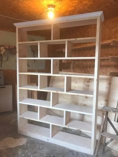 an unfinished shelving unit in the process of being built