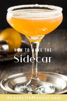 the sidecar cocktail is garnished with sugar and lemons, on a silver plate