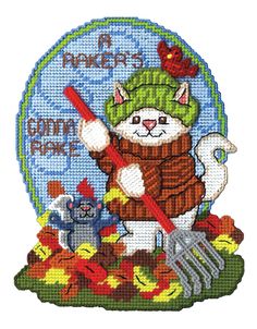 a cross stitch pattern with an image of a cat holding a shovel and fork in it's hand