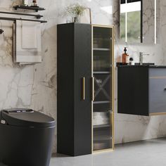 a bathroom with marble walls and flooring, black cabinet next to a toilet in front of a mirror