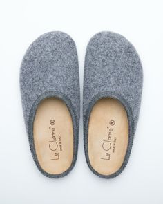 Description: The Nebraska Wool Clog in medium grey is an Italian take on a European classic. The Nebraska is one of the most versatile clog style slippers available. From home to the office to weekend, the minimalist design of these clogs will take you anywhere in comfort. The anatomical self-molding latex and thermoforming cork insole provide a firm customized comfort, and the insole is completely removable for cleaning. LeClare Slippers are exclusively handcrafted in our small-batch factory in Wool Clogs, Clog Style, Clogs Style, Clog Slippers, The Minimalist, House Shoes, Womens Clogs, Slide Slipper, Nebraska