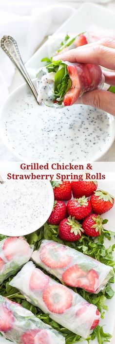 a plate with some strawberries on top of it and another plate filled with rolls