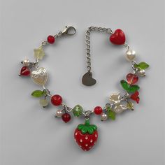 * perfect for those that love garden cottage core and strawberry themed accessories! handmade with silver, glass and acrylic beads  length: 7-8.5 inches dm with any questions, custom requests, changes or adjustments! BUY MULTIPLE (2 or more): - dm me with the quantity, i'll change the settings and give you a discount code (for bulk orders) - checkout with the correct address - if you want to send to different addresses, checkout multiple times pls handle with care and avoid water contact <3 checkout my page for more jewelry and accessories :) Strawberry Shortcake Bracelet, Acrylic Nails Almond Shape, Cluster Bracelets, Almond Acrylic Nails, Almond Shape, Nails Almond, Handmade Gifts For Her, Silver Glass, Accessories Handmade