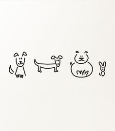 an image of three dogs that are drawn in black and white on a piece of paper