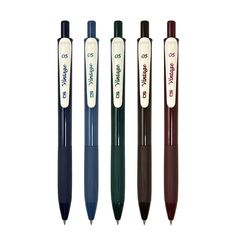 three pens with different colors and writing on them