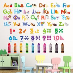 children's wall decals with colorful letters and numbers on the wall in a child's room