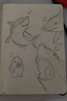 a drawing of sharks and fish in the water